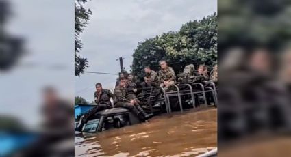 VÍDEO: Coluna de caminhões do Exército é engolida pelas águas no RS